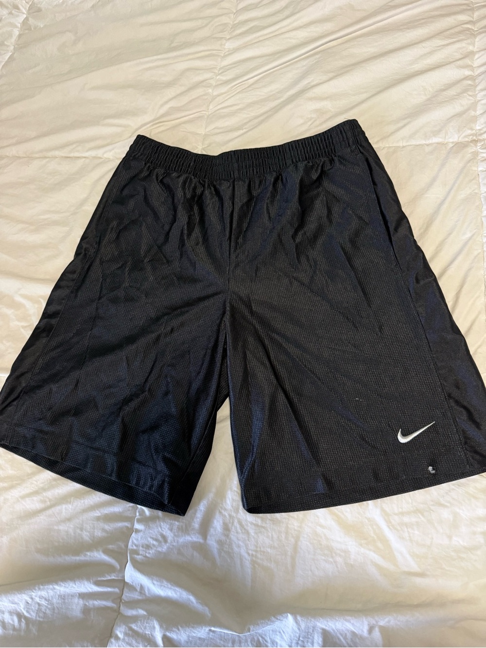 Nike Men’s Black Mesh Athletic Shorts with White Swoosh